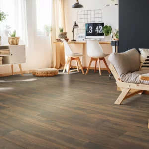 Wood-look laminate flooring in a living space | Petersen's Carpet & Flooring