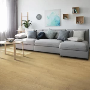 Neutral colored laminate flooring in a living room | Petersen's Carpet & Flooring