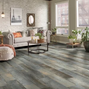 Multi-tone luxury vinyl plank flooring in a living room | Petersen's Carpet & Flooring