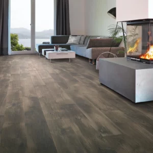 Dark wood-look laminate flooring in living room | Petersen's Carpet & Flooring