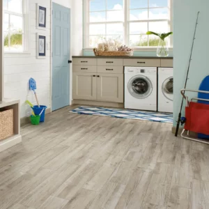 waterproof luxury vinyl flooring in a laundry room | Petersen's Carpet & Flooring