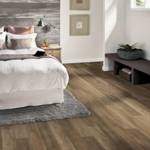 luxury vinyl flooring in a bedroom | Petersen's Carpet & Flooring