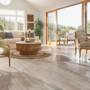 Modern space with multi-tone hardwood flooring | Petersen's Carpet & Flooring