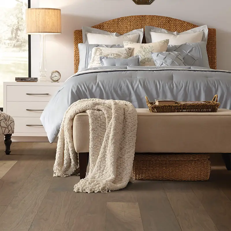 Hardwood flooring in a bedroom | Petersen's Carpet & Flooring