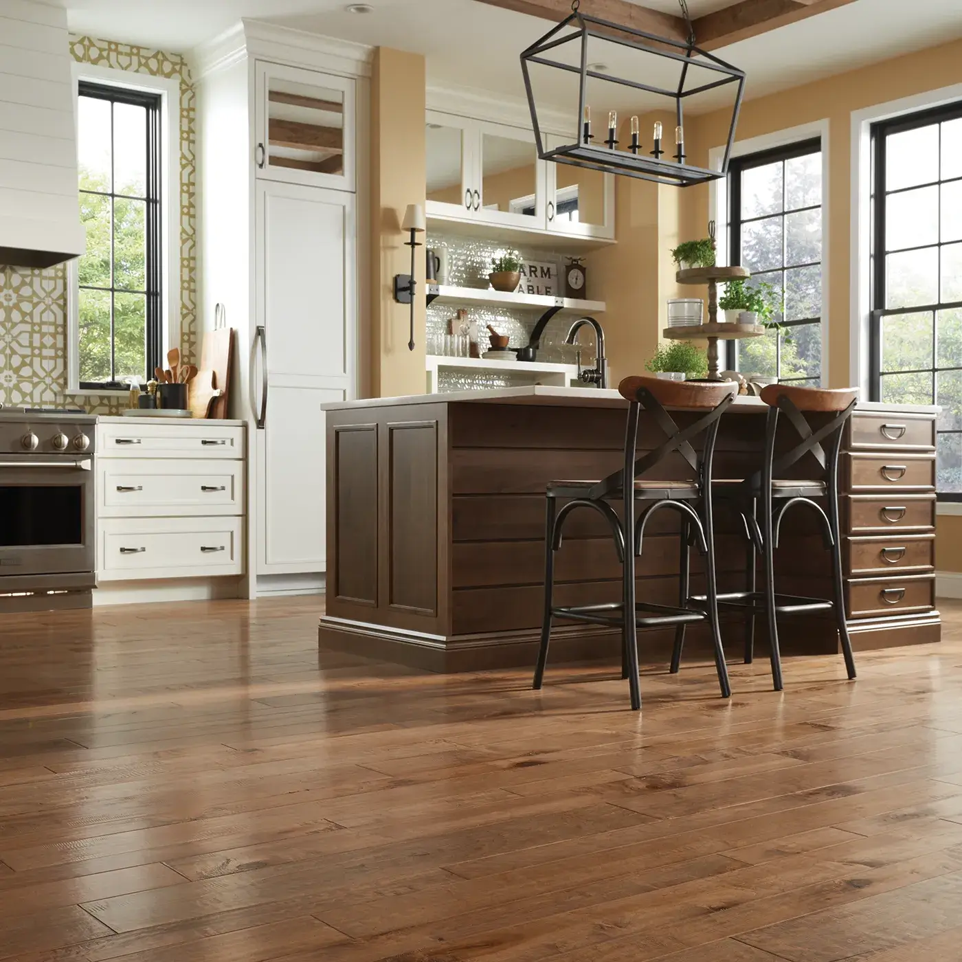 YukonMaple-SW549-01001-GoldDust-MixWidth Medium brown hardwood flooring in a kitchen | Petersen's Carpet and Flooring